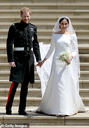 الأمير هاري وميغان ماركل في صورة يوم زفافهما في عام 2018