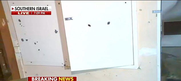 وكانت الأبواب مليئة بالرصاص، وهو دليل على ضراوة هجوم حماس يوم السبت