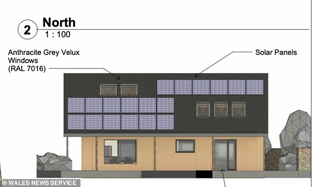 في الصورة هنا خطط للمنزل الجديد الصديق للبيئة.  وسيحتوي على ألواح شمسية على السطح
