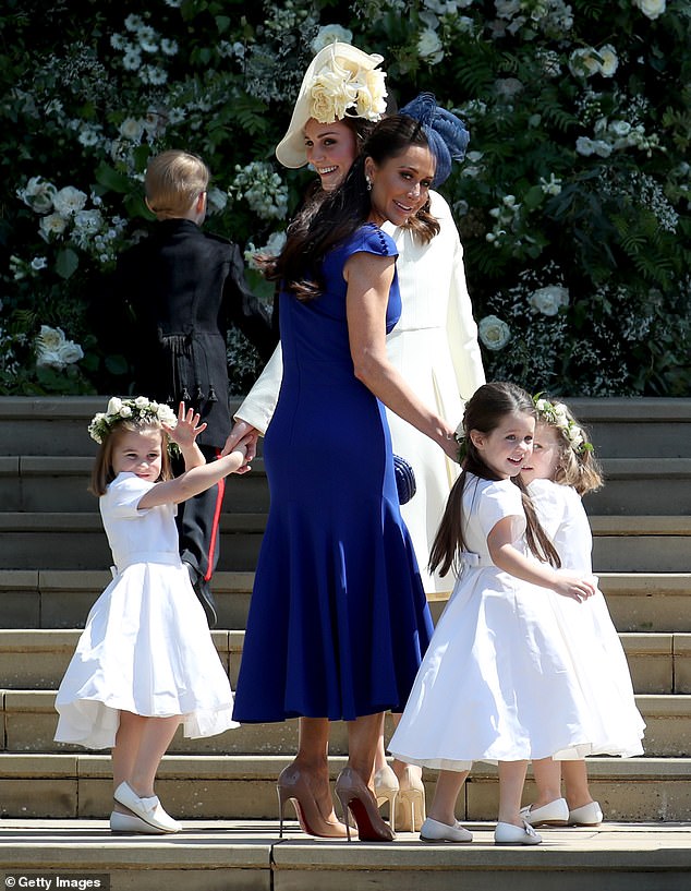 مولروني مع ابنتها آيفي والأميرة شارلوت وفلورنس فان كوستم وأميرة ويلز في حفل زفاف ميغان وهاري عام 2018 في قلعة وندسور